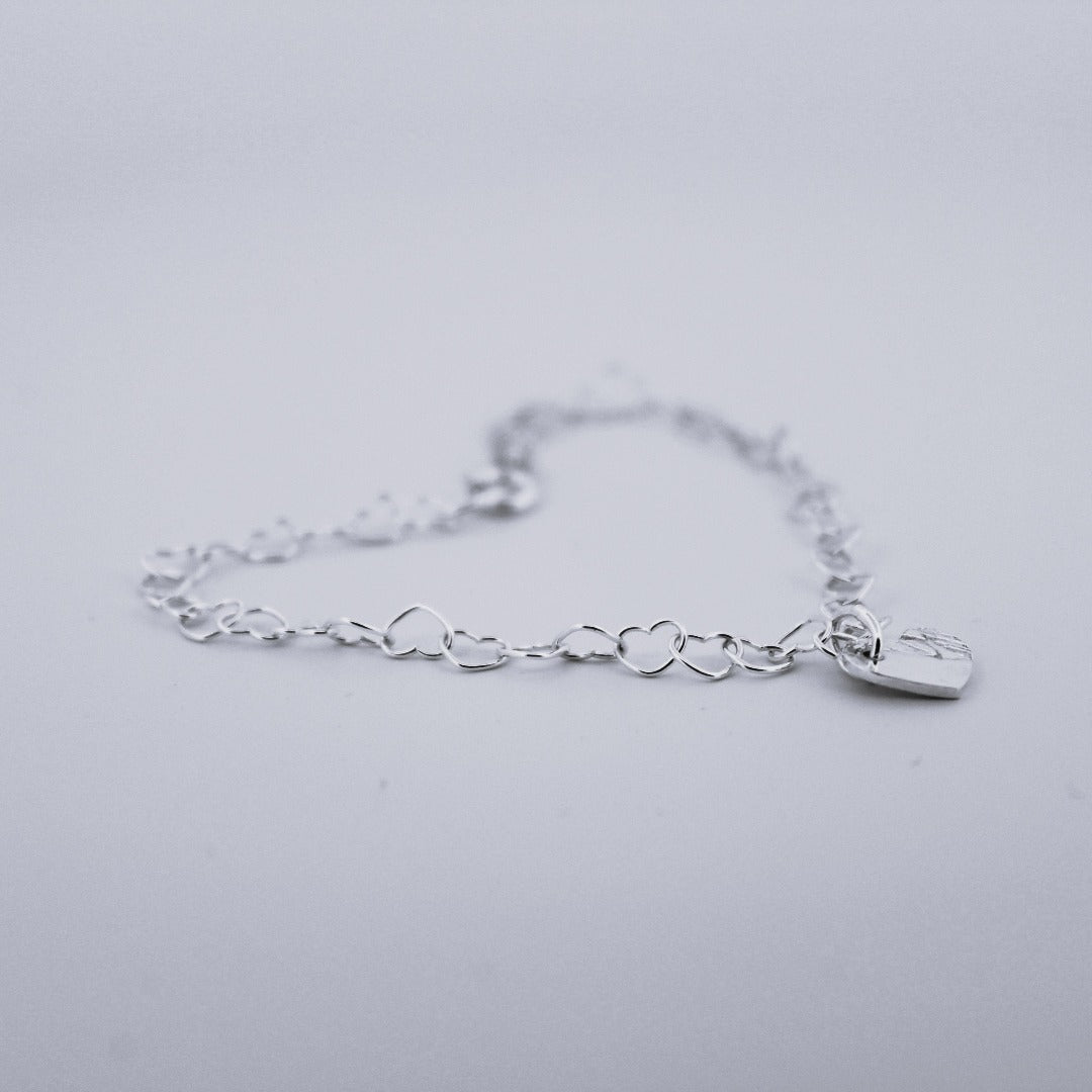 Sterling Silver Heart Chain Bracelet with Heart Charm from Shine On