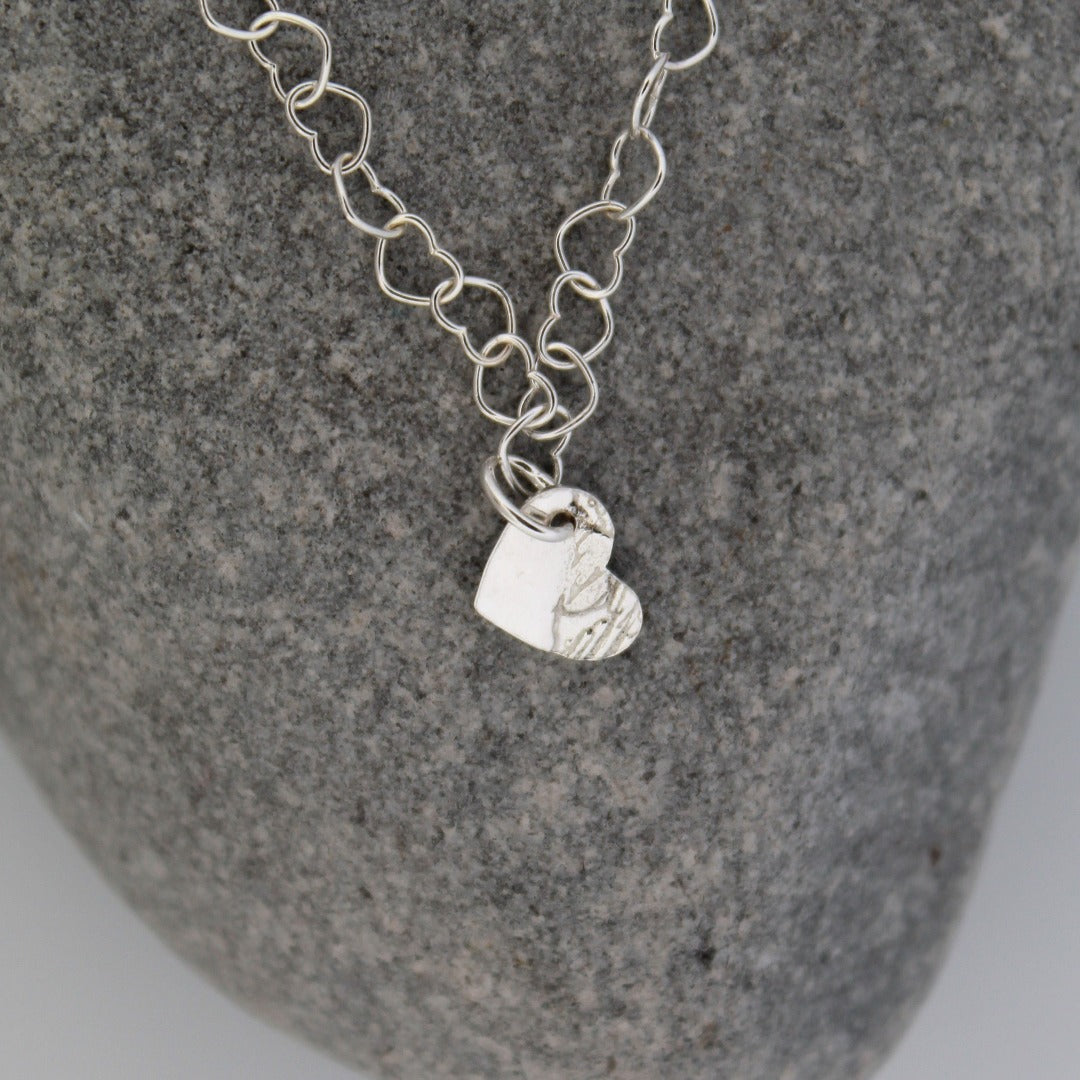 Sterling Silver Heart Chain Bracelet with Heart Charm from Shine On