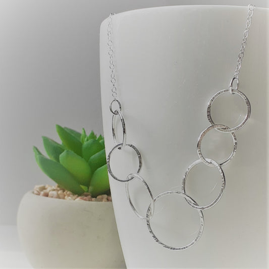 Sterling Silver Seven Ring Interlocking Circle Necklace - Shine On Shop