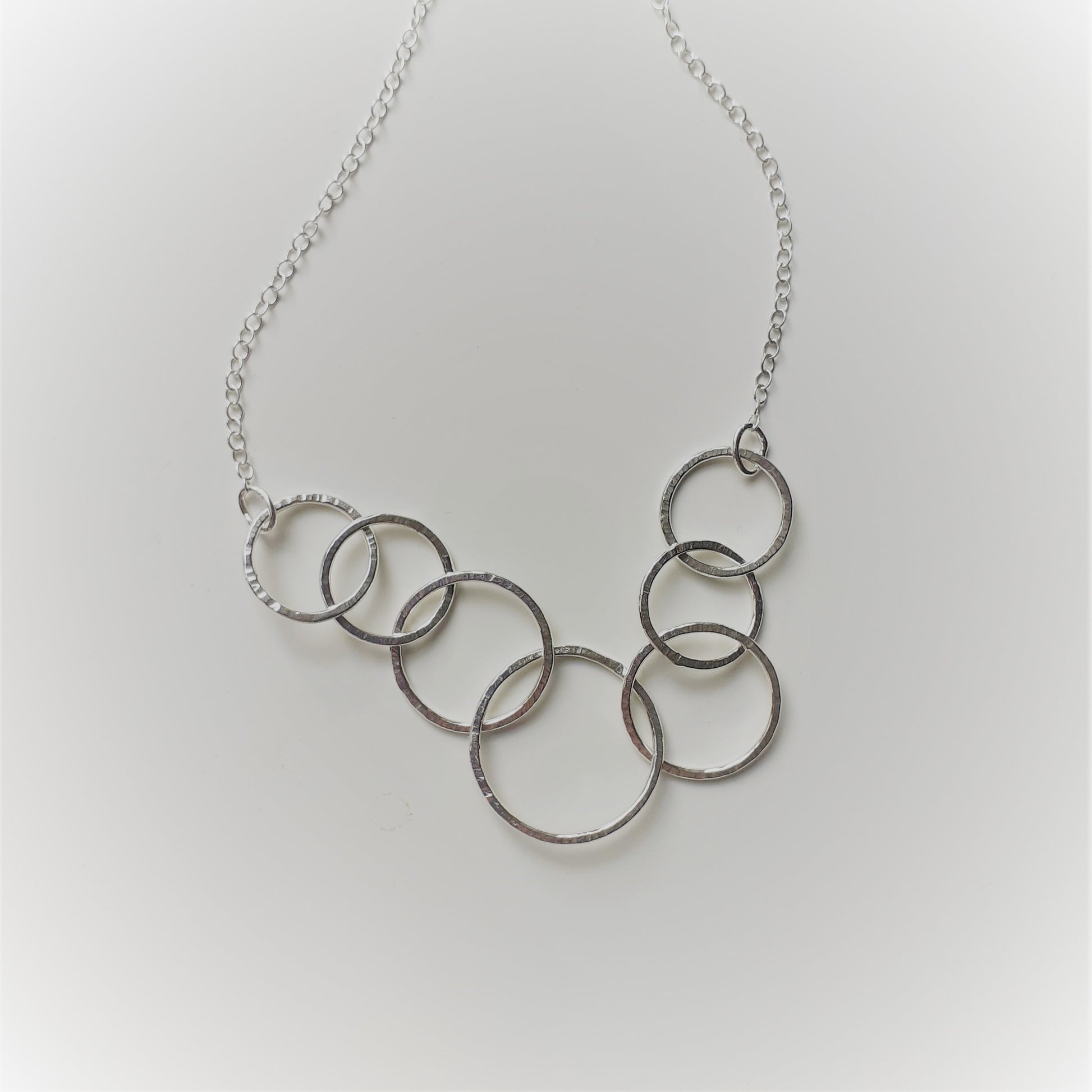 Sterling Silver Seven Ring Interlocking Circle Necklace – Shine On
