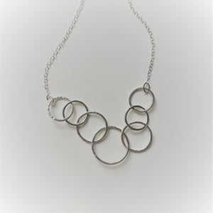 Sterling Silver Seven Ring Interlocking Circle Necklace - Shine On Shop