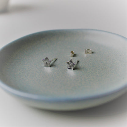 Shine On Sterling Silver Studs, Star Earrings in pale green dish