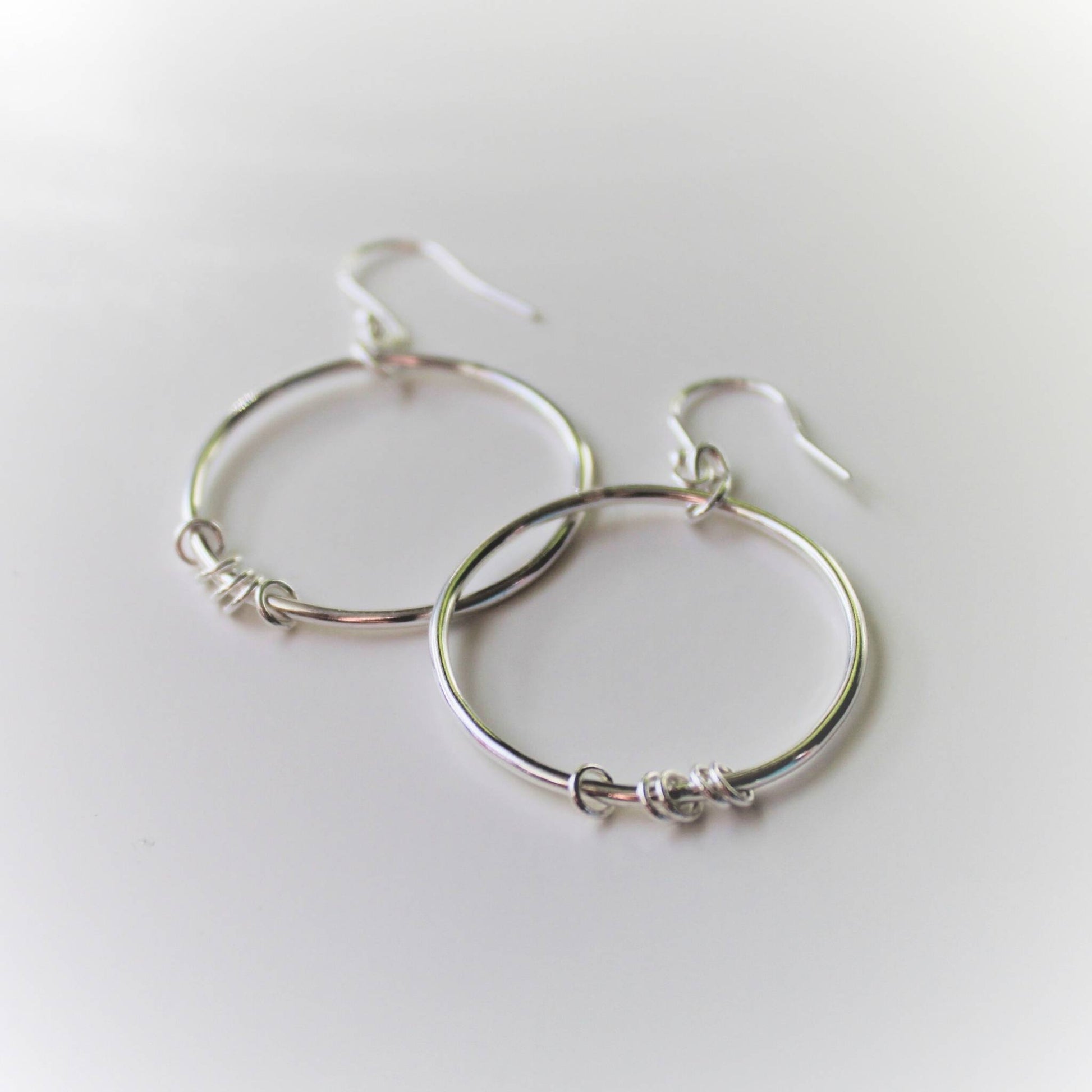 Sterling Silver Orbit Hoops on white background